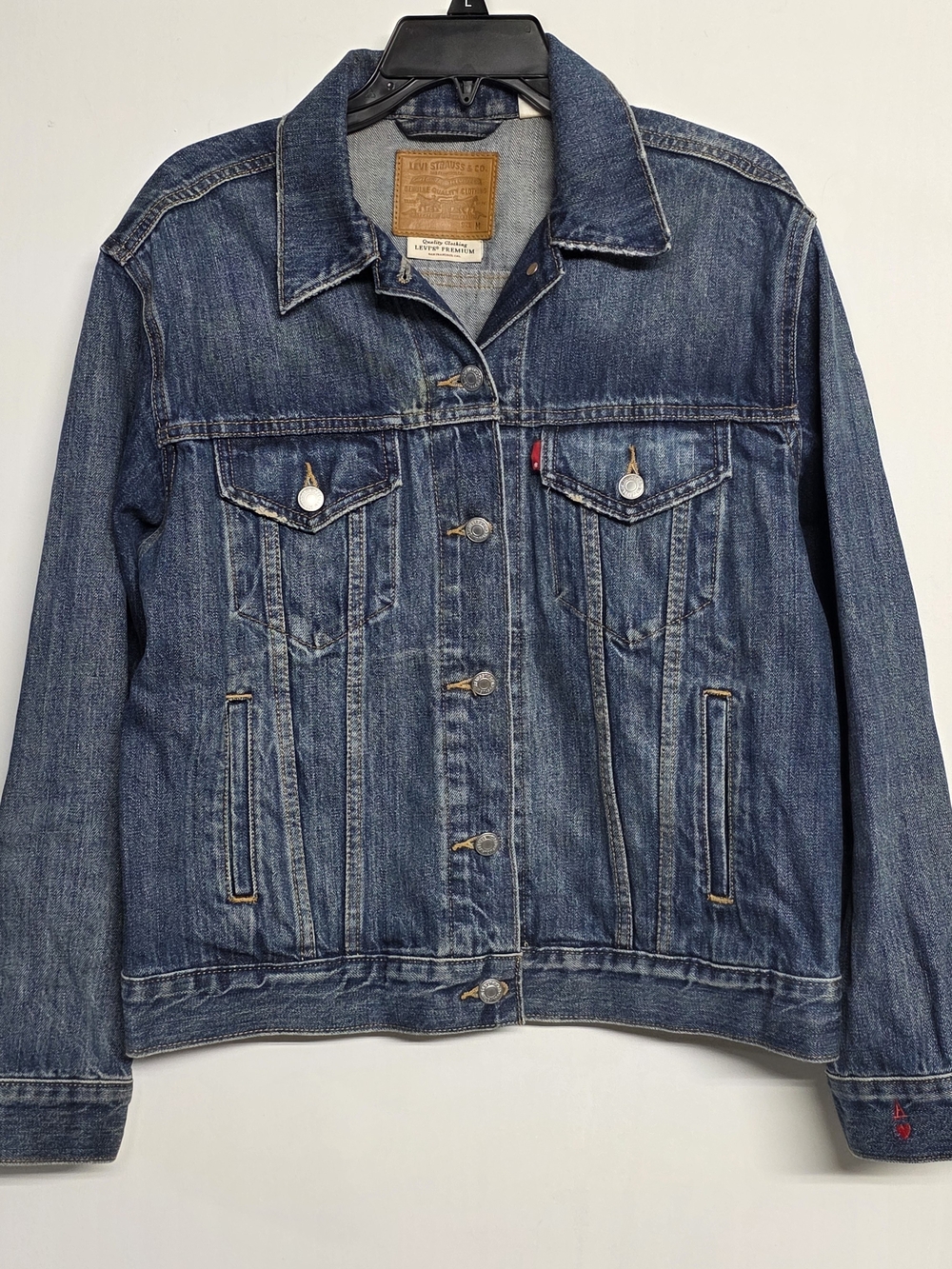 Levi’s Premium Denim Jacket – Women’s Size M A ♥” embroidery on the cuff.